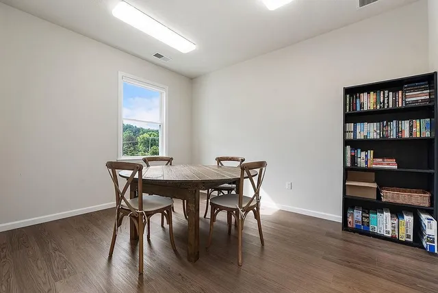 an aerial view of a house with outdoor space