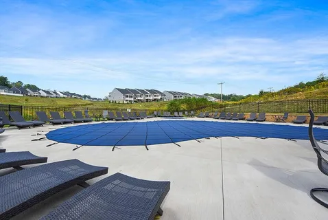 an aerial view of a house with a lake view