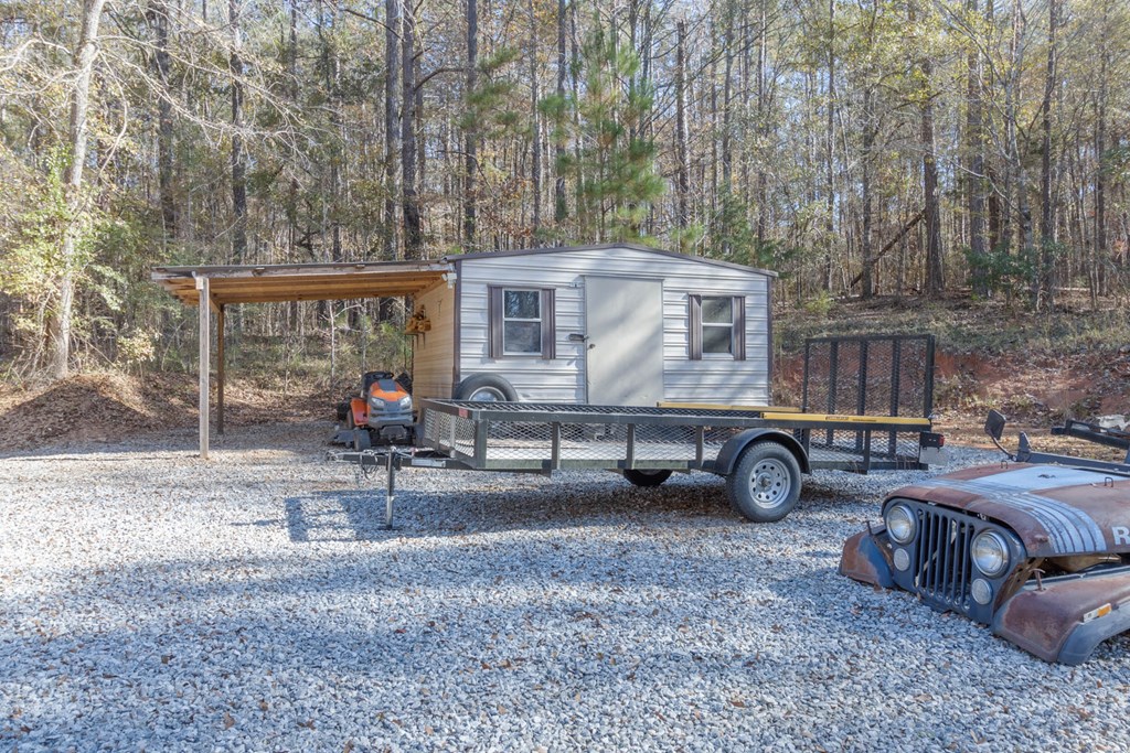1274 Grey Rock Road Midland, GA 31820 - Photo 26 of 30 Outbuilding with gravel
