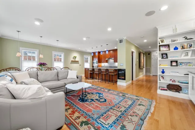 a living room with furniture and a table