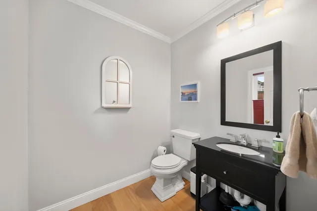 a spacious bathroom with a double vanity sink and mirror