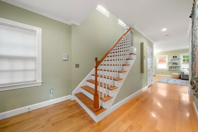 a view of entryway with wooden floor