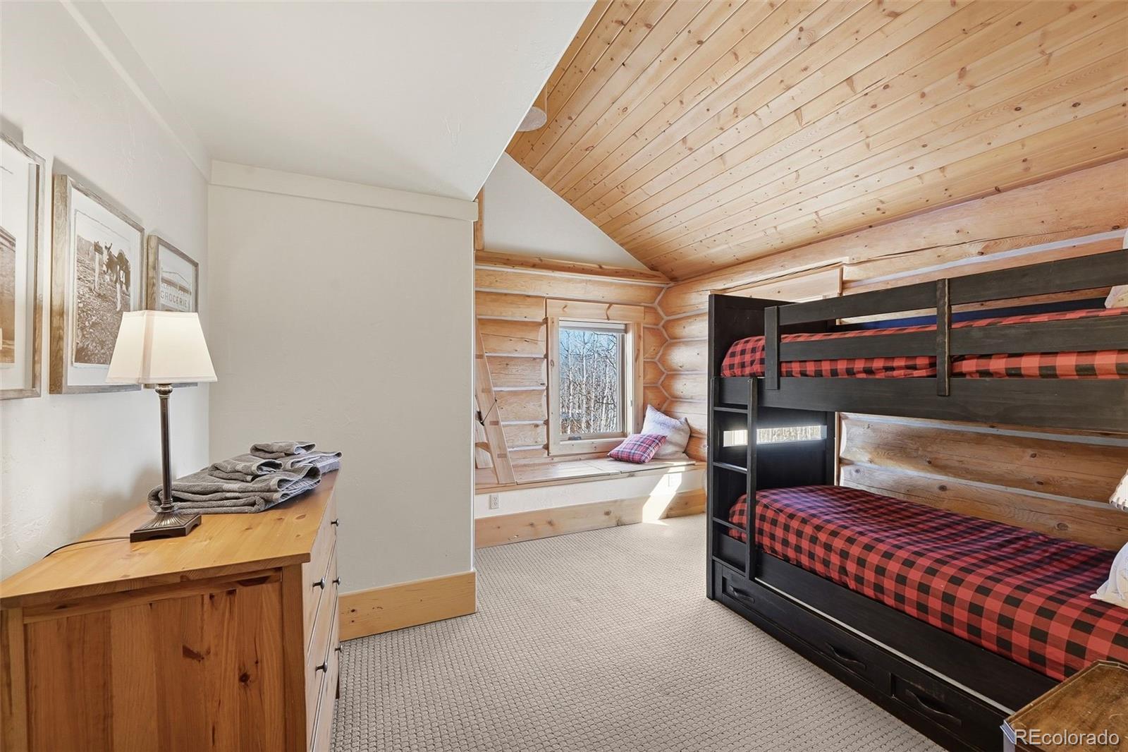252 Iron Mountain Road Fairplay, CO 80440 - Photo 11 of 50 a living room with furniture and a lamp