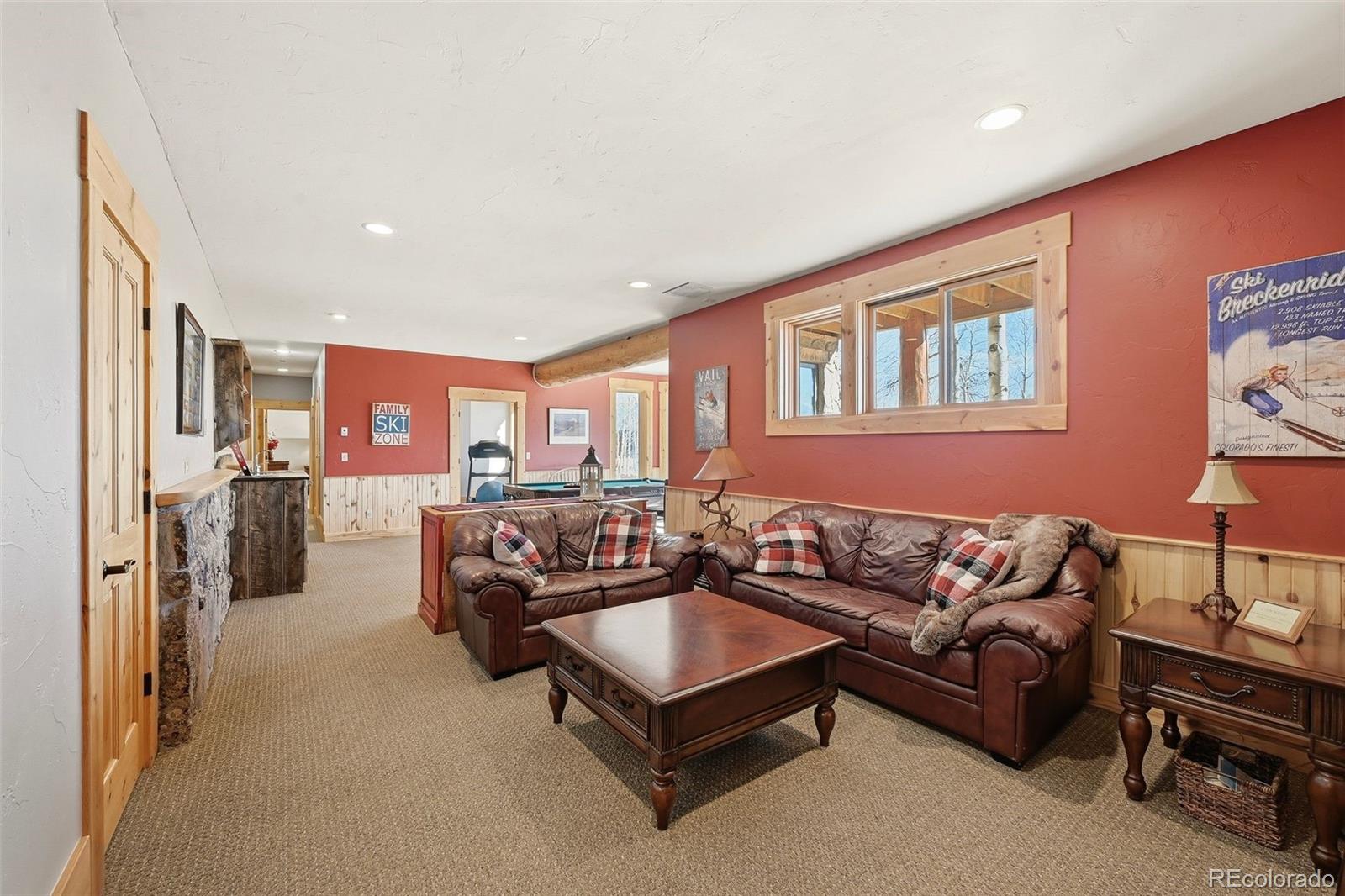 252 Iron Mountain Road Fairplay, CO 80440 - Photo 20 of 50 a living room with furniture and a flat screen tv