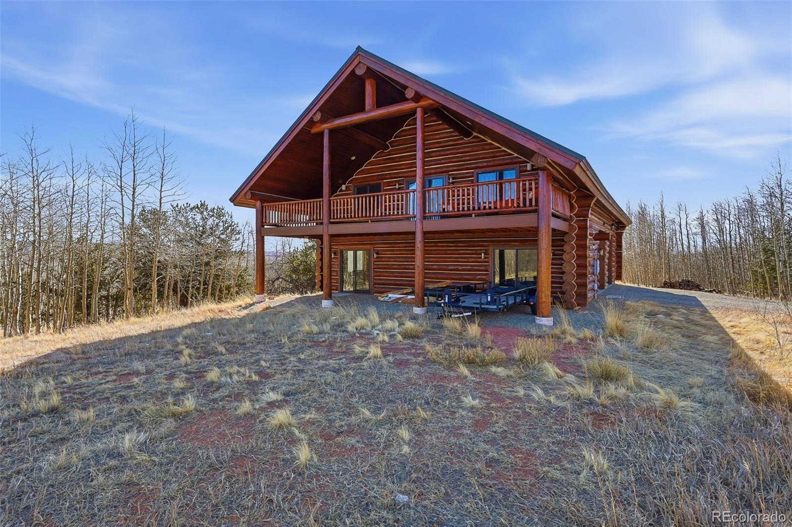 252 Iron Mountain Road Fairplay, CO 80440 - Photo 39 of 50 a view of a house with a yard and wooden fence