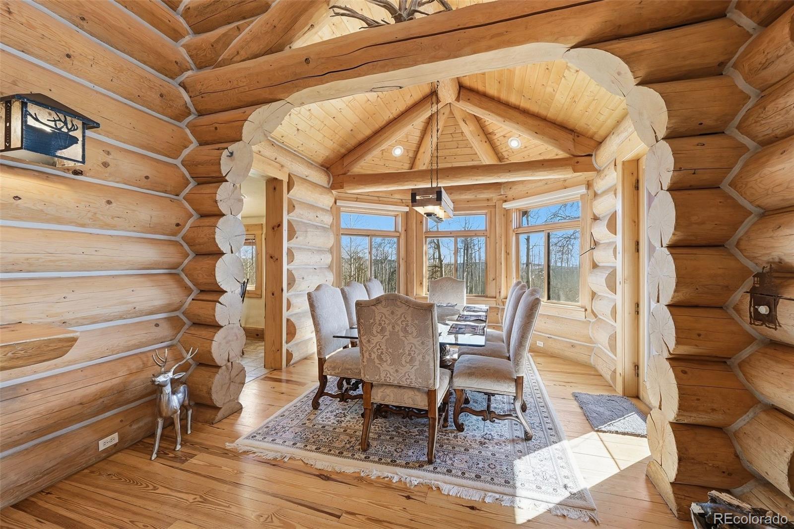 252 Iron Mountain Road Fairplay, CO 80440 - Photo 5 of 50 a dining room with furniture and wooden floor