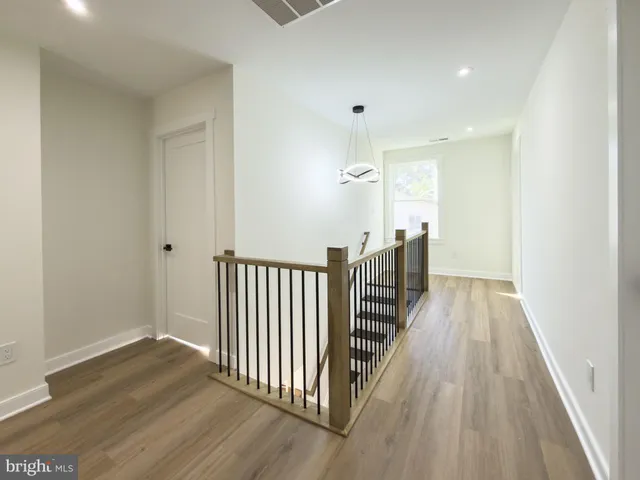 a view of a swimming pool with a yard