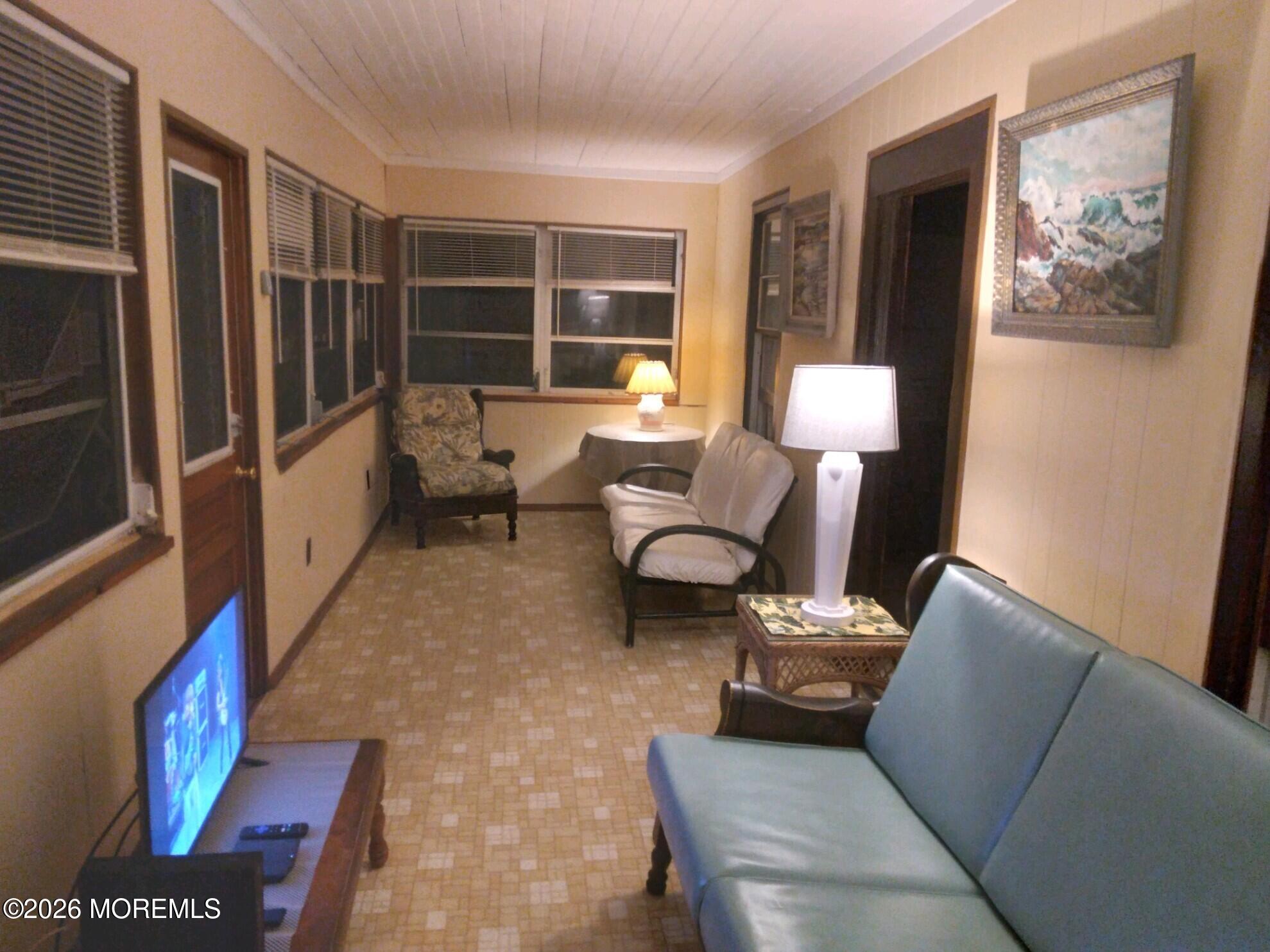 10 Lake Street Point Pleasant Beach, NJ 08742 - Photo 19 of 20 a living room with furniture and a window