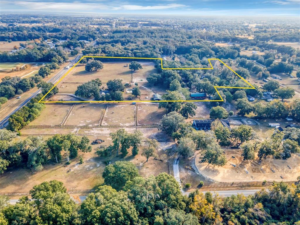 208 Northeast 70th Street Ocala, FL 34475 - Photo 61 of 71 an aerial view of residential building and lake view