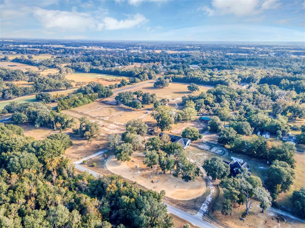 208 Northeast 70th Street Ocala, FL 34475 - Photo 62 of 71 an aerial view of residential houses with outdoor space