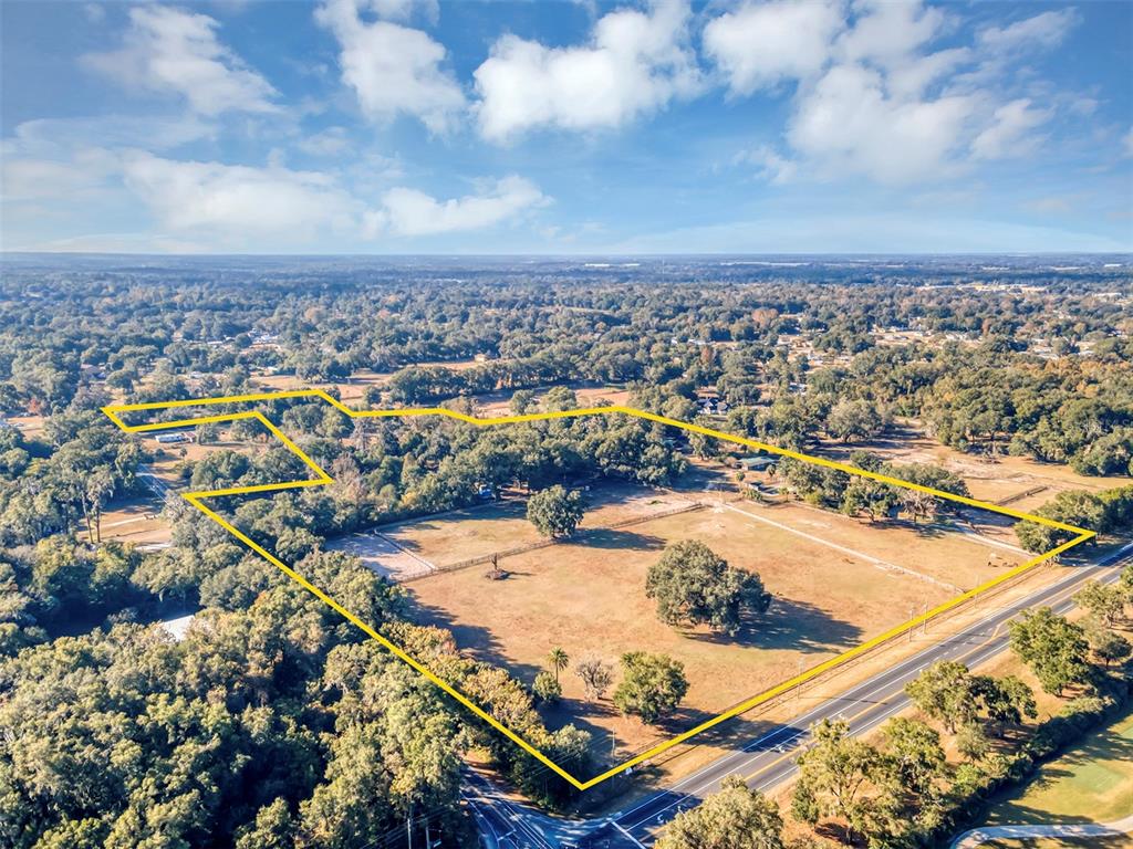 208 Northeast 70th Street Ocala, FL 34475 - Photo 71 of 71 an aerial view of residential houses with outdoor space