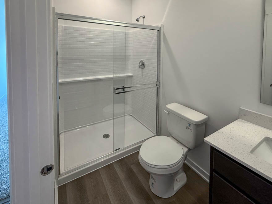 2459 Scribe Street Oswego, IL 60543 - Photo 8 of 26 a bathroom with a toilet and a shower
