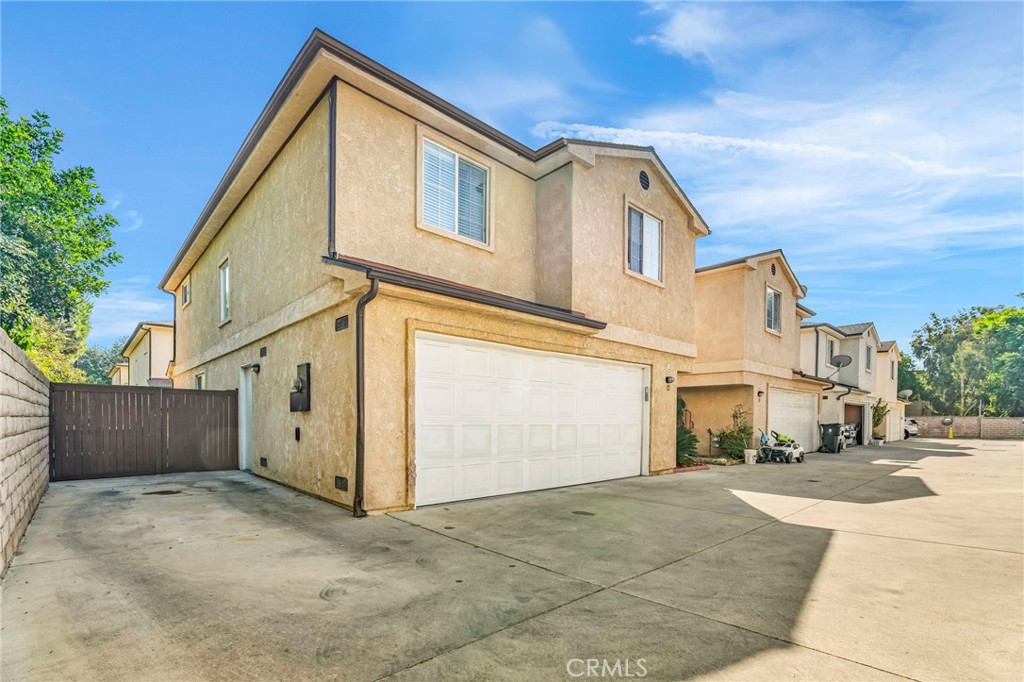 9155 Cedros Avenue, Unit 12 Panorama City, CA 91402 - Photo 2 of 34 Front, 2 car garage + 1 parking space