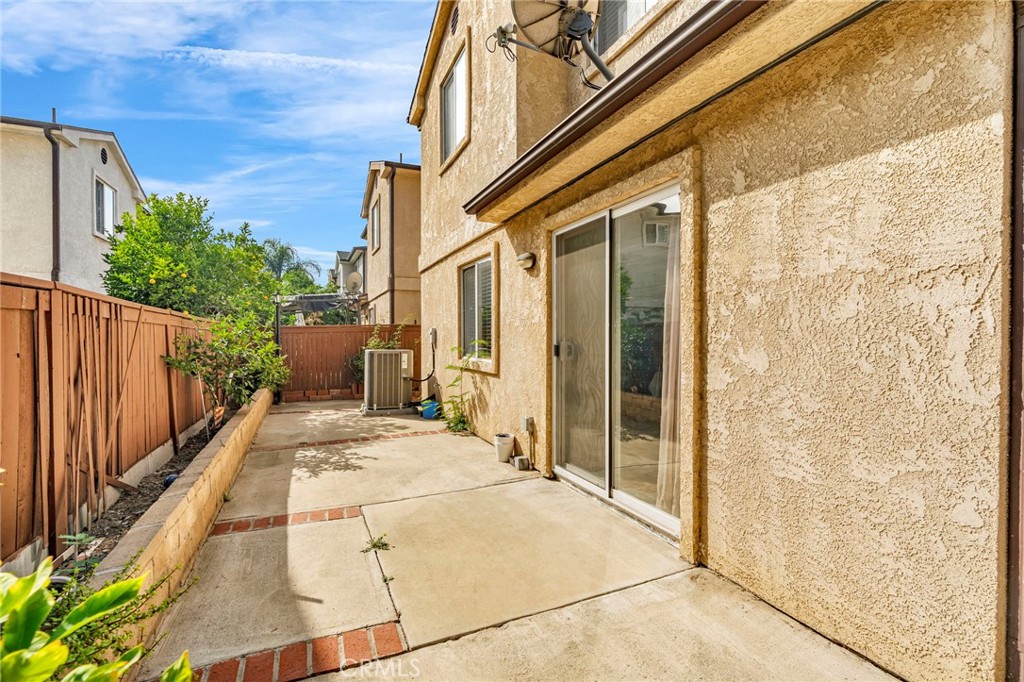 9155 Cedros Avenue, Unit 12 Panorama City, CA 91402 - Photo 31 of 34 Backyard, sliding door to Dining Room