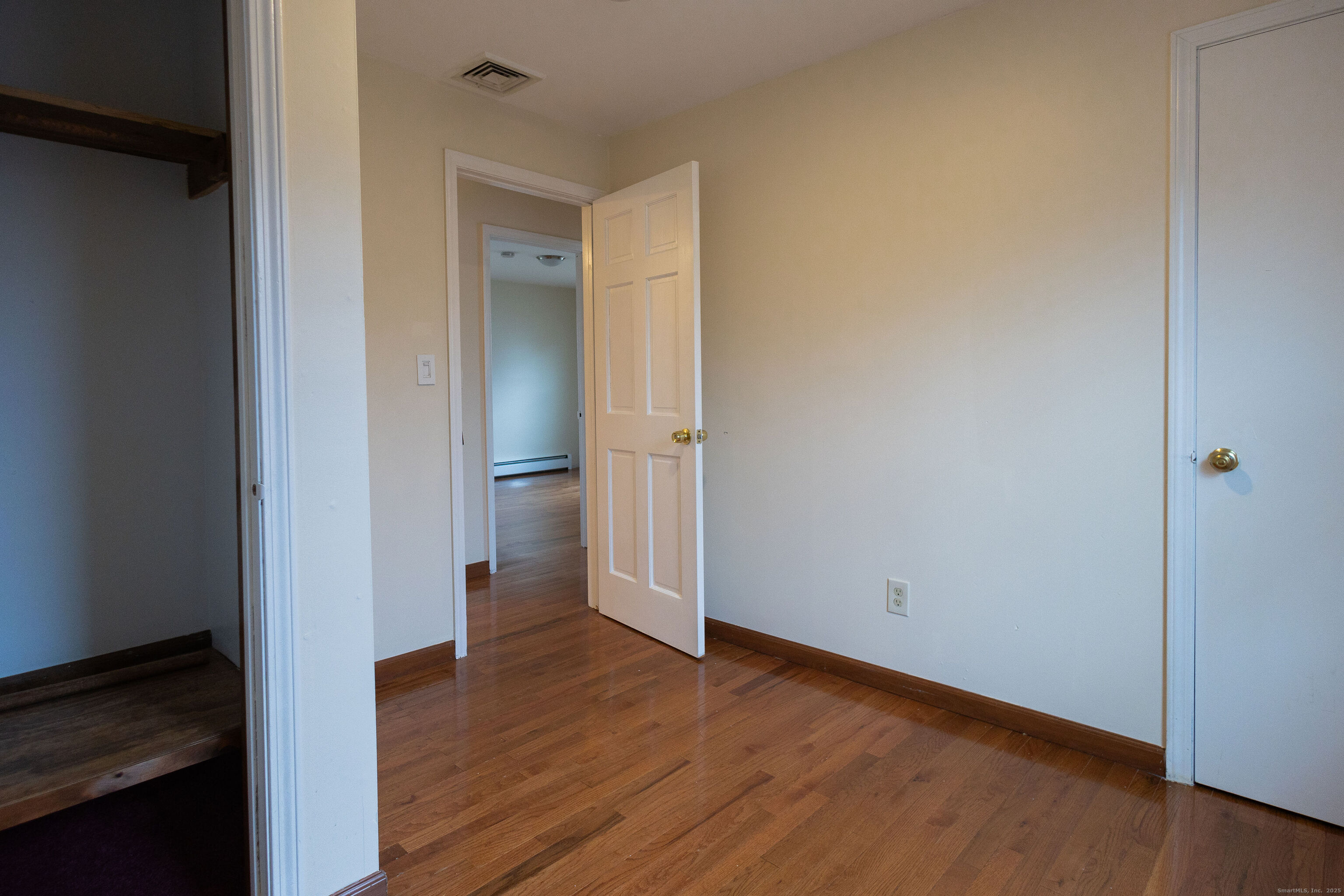 138 Infield Street Bridgeport, CT 06606 - Photo 18 of 31 wooden floor in an empty room
