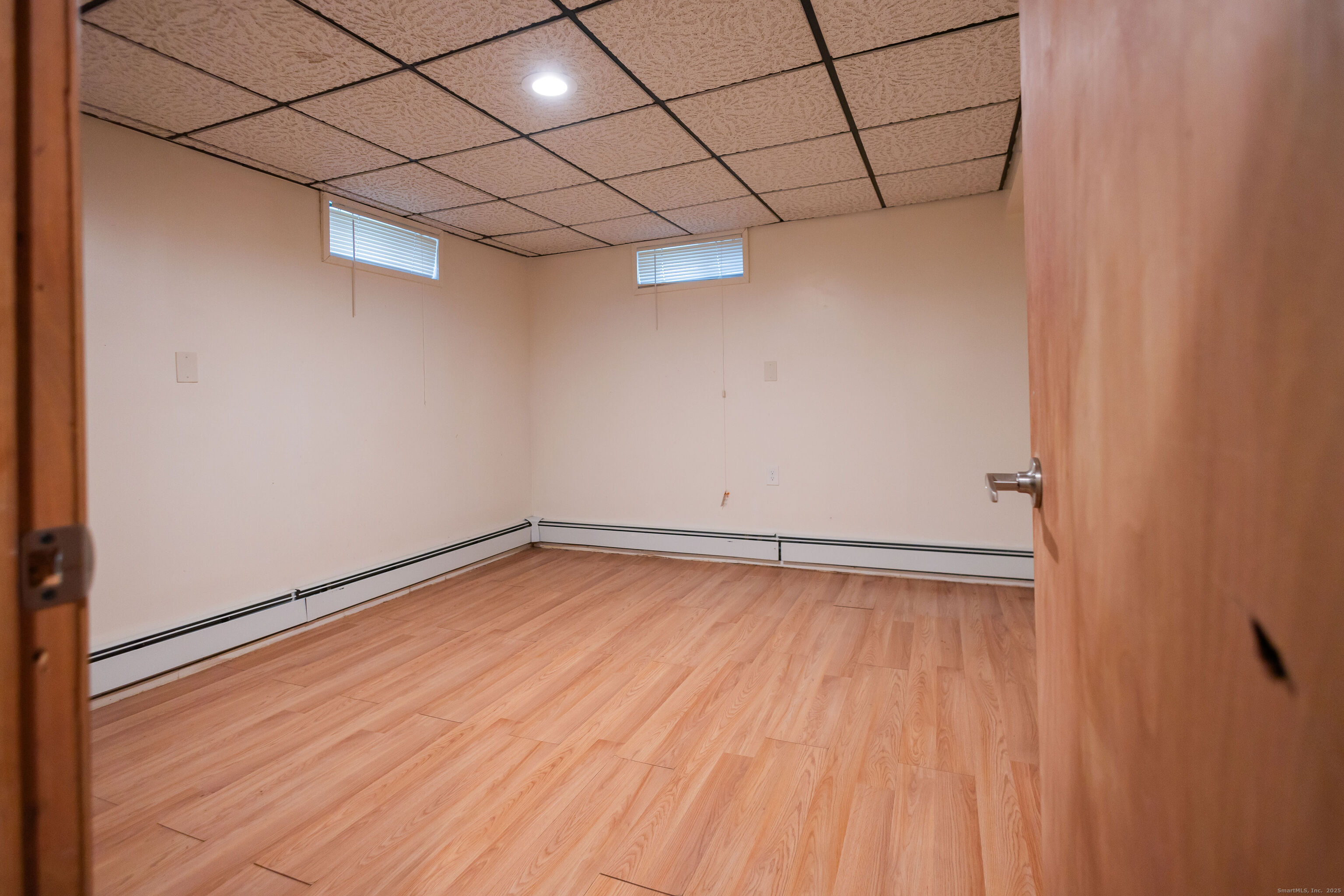 138 Infield Street Bridgeport, CT 06606 - Photo 26 of 31 a view of a room with wooden floor