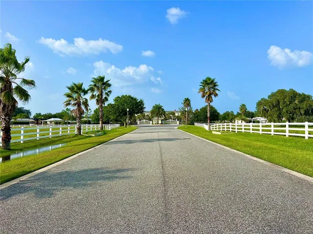 a view of road and houses