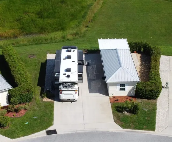 an aerial view of a house having outdoor space patio and mountain view