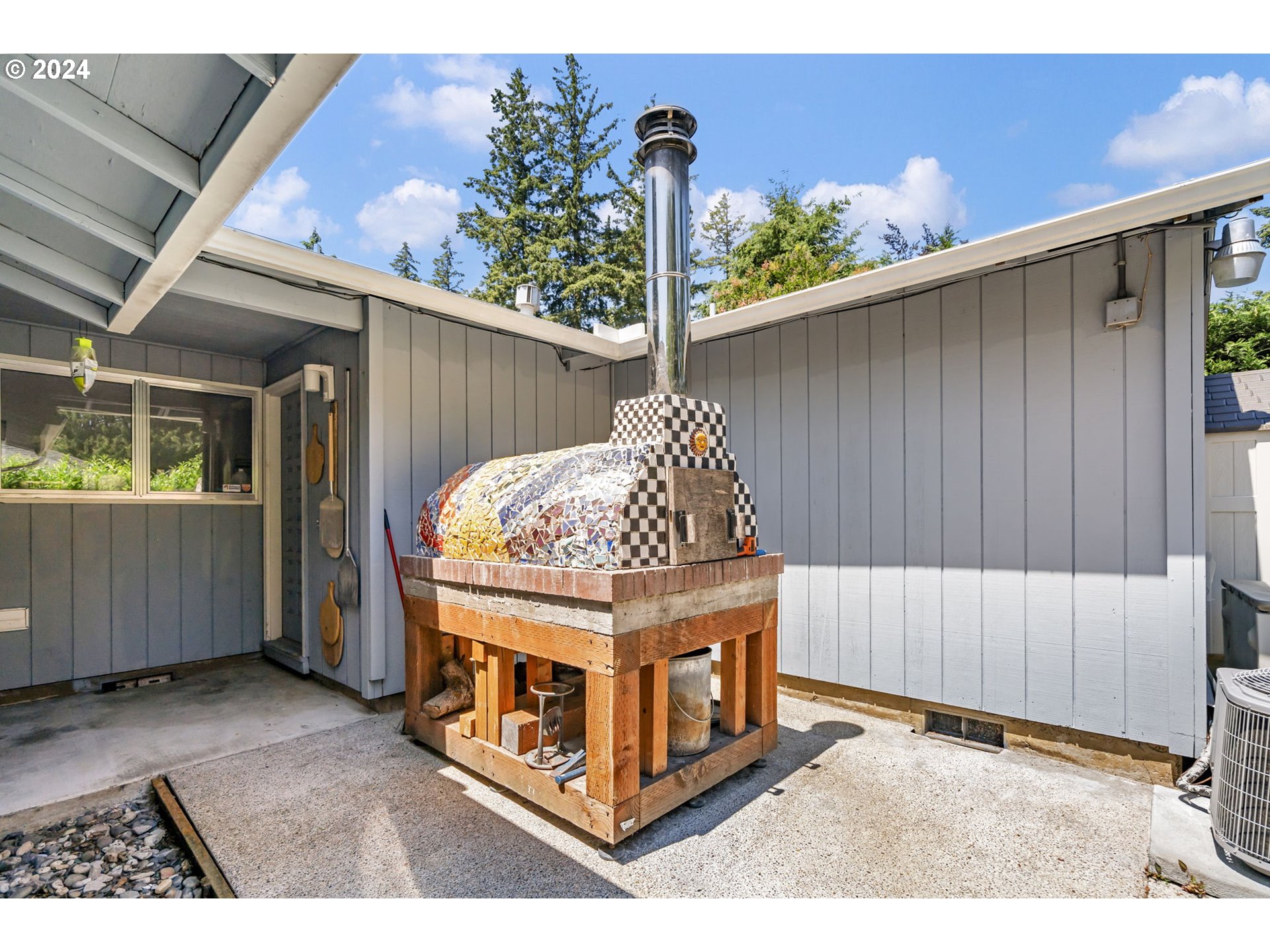 4409 Southwest Kanan Drive Portland, OR 97221 - Photo 19 of 25 a view of outdoor space with wooden fence