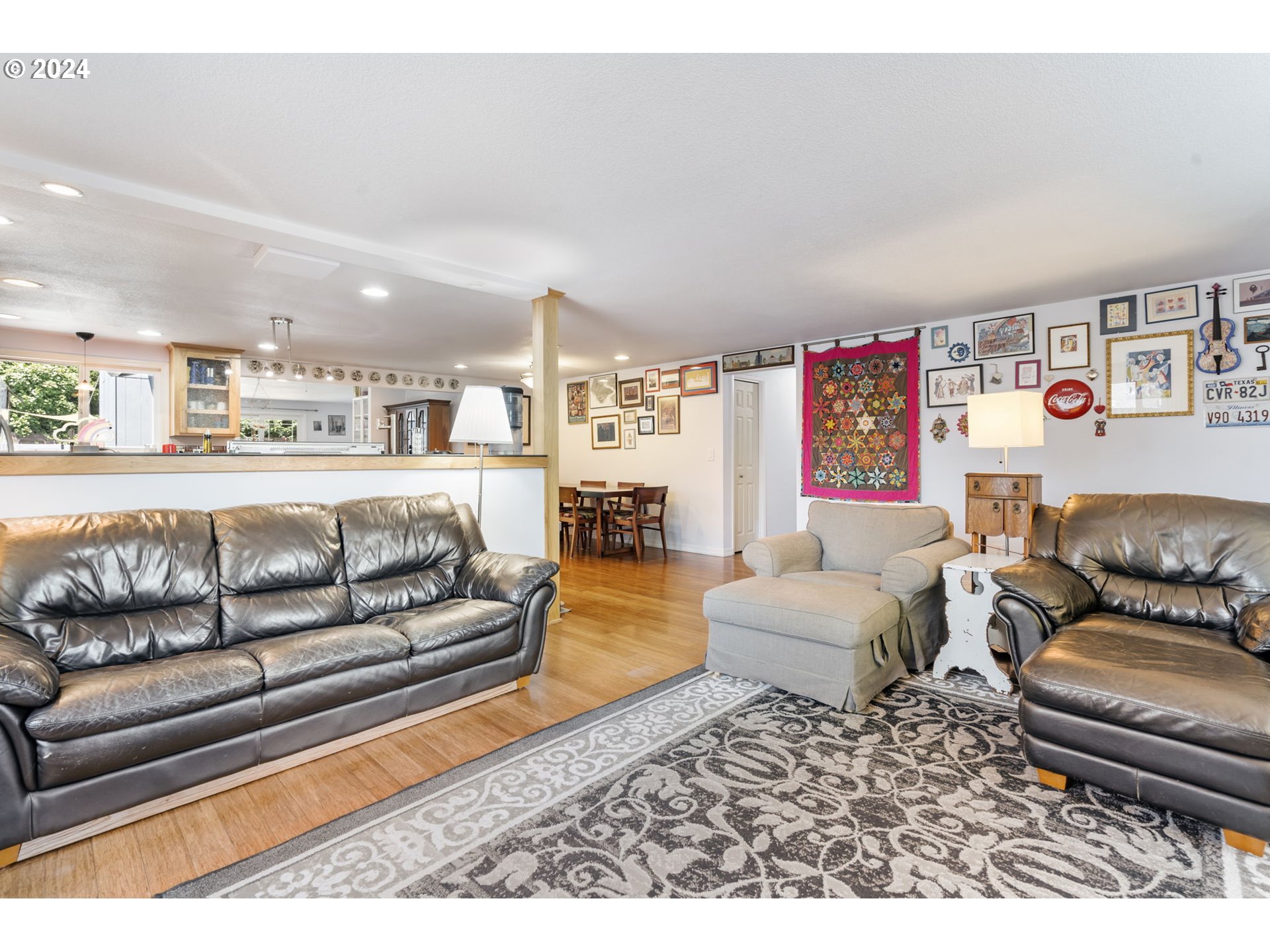 4409 Southwest Kanan Drive Portland, OR 97221 - Photo 6 of 25 a living room with furniture and a couch