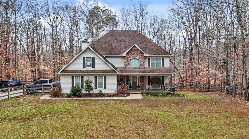 1075 Johnson Brady Road Canton, GA 30115 - Photo 15 of 30 a front view of a house with a yard
