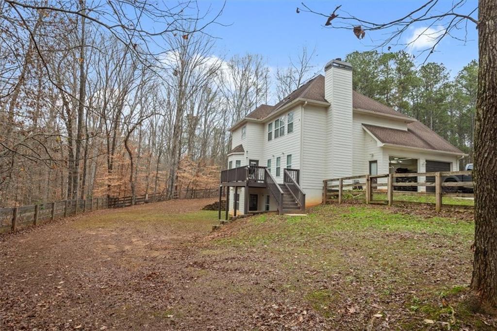 1075 Johnson Brady Road Canton, GA 30115 - Photo 16 of 30 a view of a house with backyard