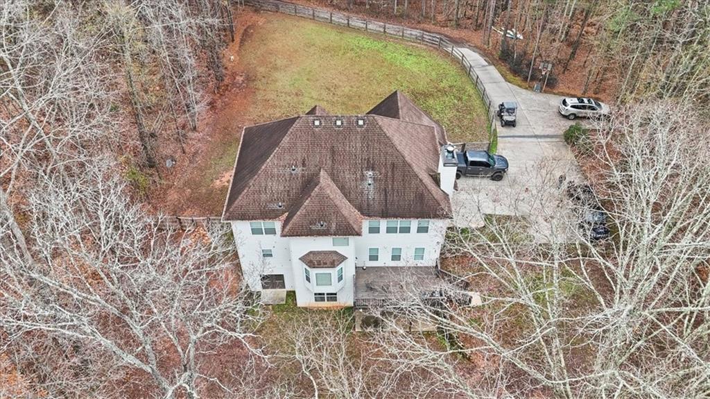 1075 Johnson Brady Road Canton, GA 30115 - Photo 21 of 30 a aerial view of a house with table and chairs