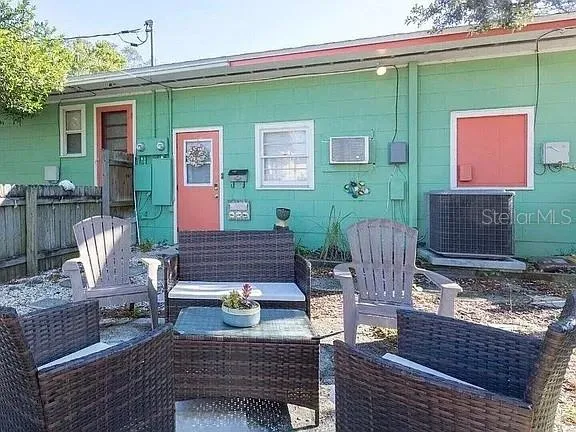 a view of a deck with furniture