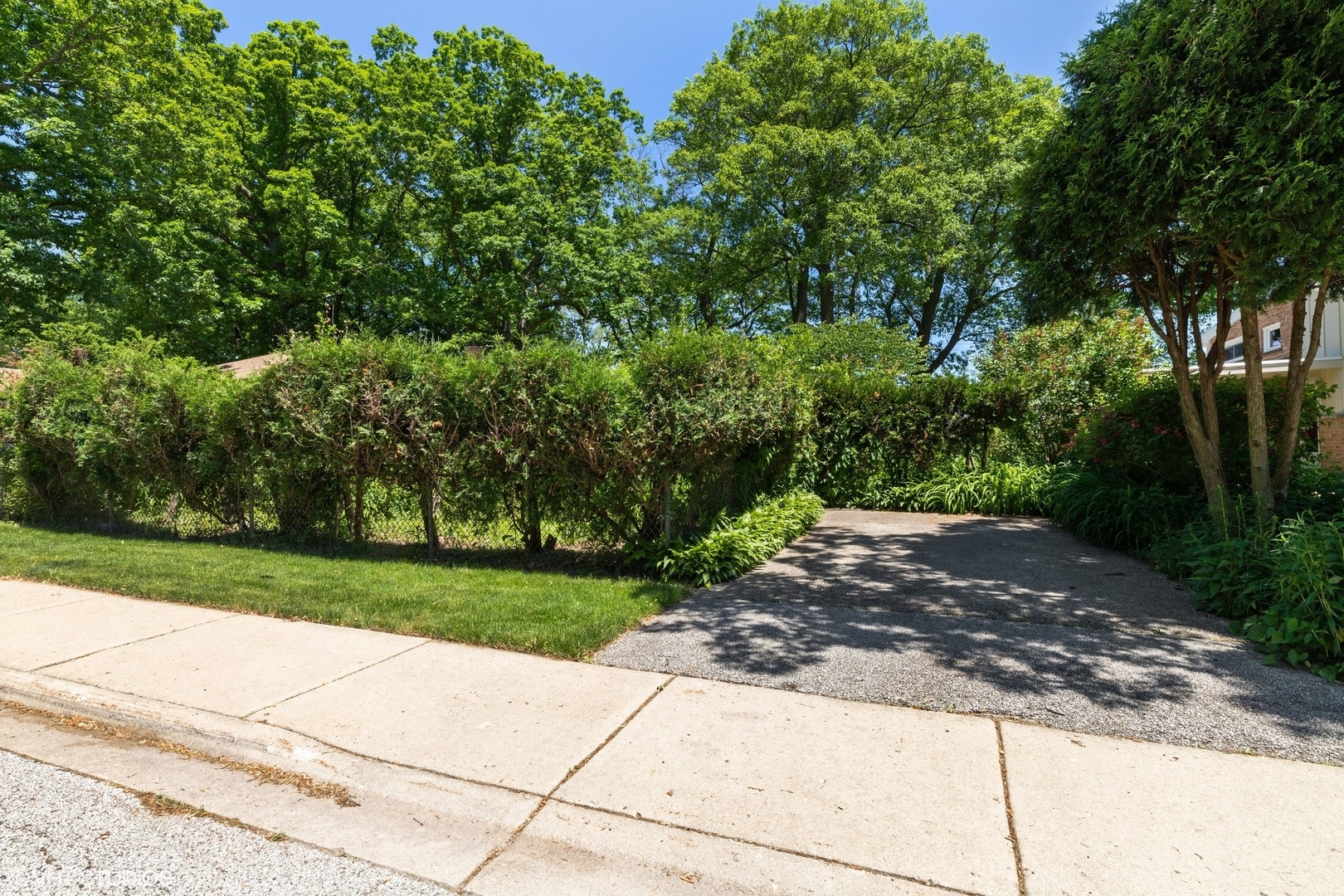 1015 Longaker Road Northbrook, IL 60062 - Photo 11 of 12 a view of a street with a trees