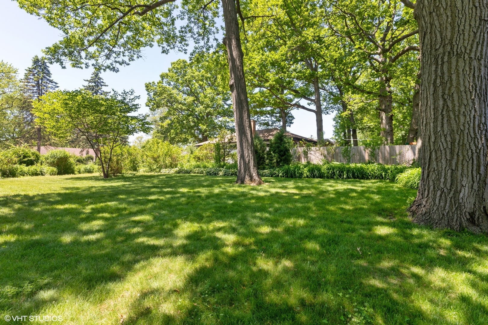1015 Longaker Road Northbrook, IL 60062 - Photo 5 of 12 a view of outdoor space with deck and tree