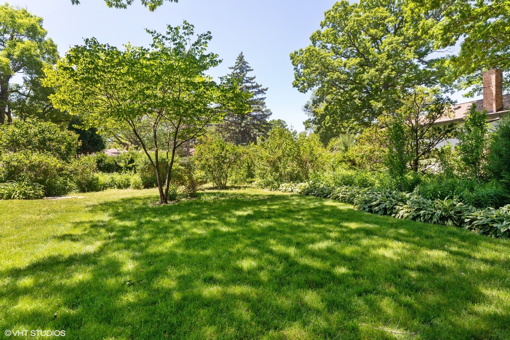1015 Longaker Road Northbrook, IL 60062 - Photo 6 of 12 a view of outdoor space with a yard