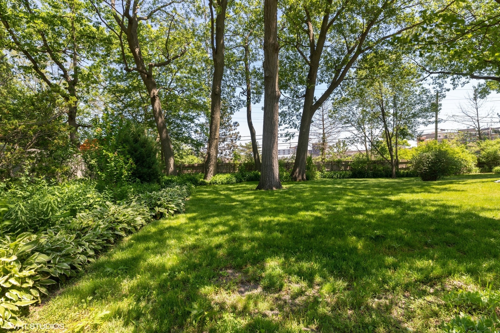 1015 Longaker Road Northbrook, IL 60062 - Photo 7 of 12 a view of backyard with green space