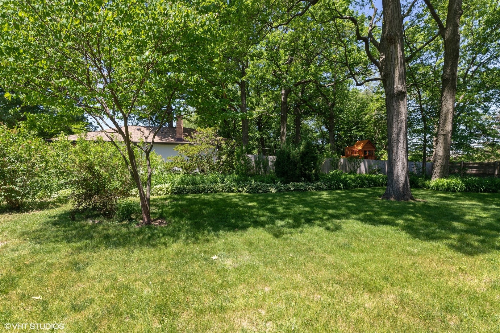 1015 Longaker Road Northbrook, IL 60062 - Photo 8 of 12 a big yard with lots of green space and trees
