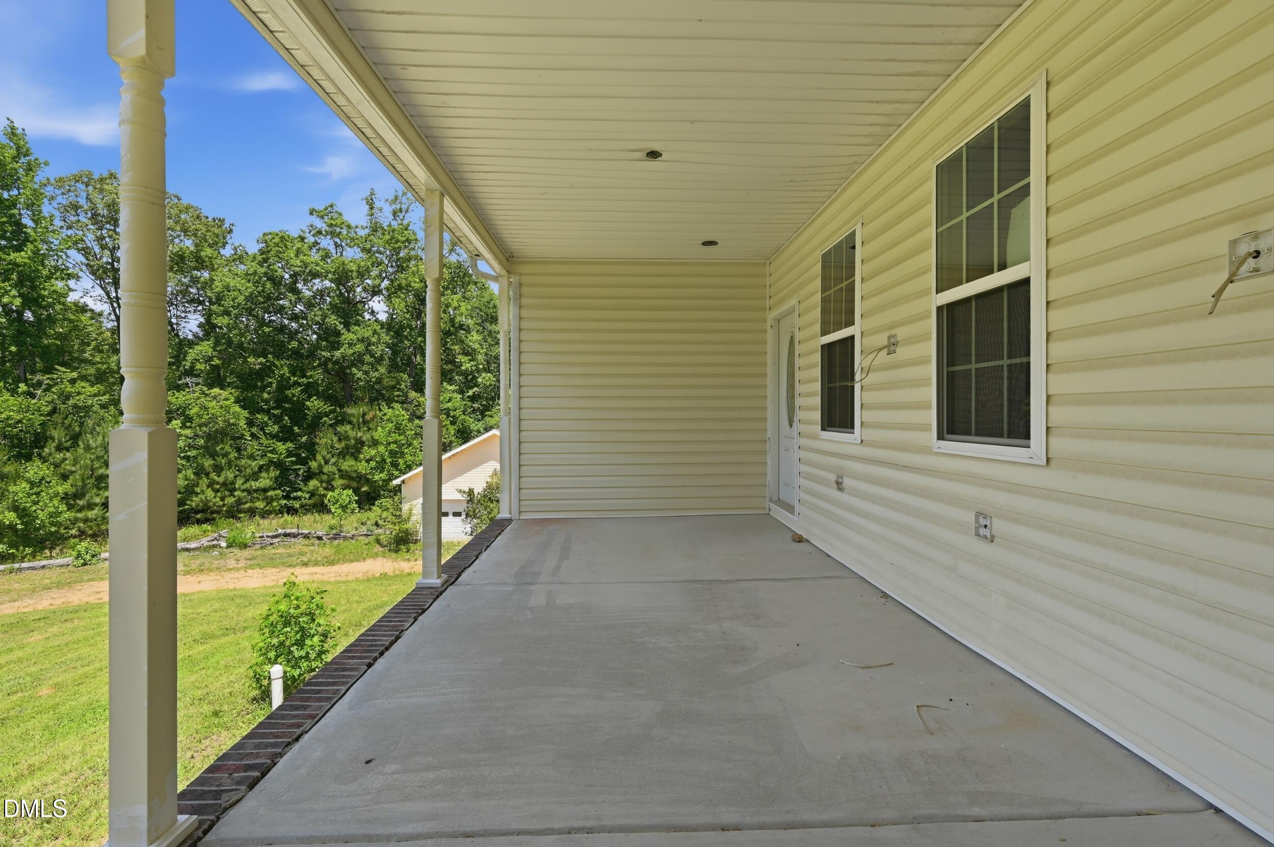 129 Shaman Drive Spring Hope, NC 27882 - Photo 8 of 43 a view of a porch
