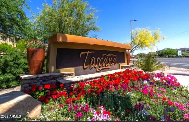 a front view of house with sign board