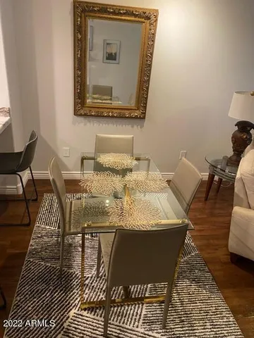 a view of a dining room with furniture