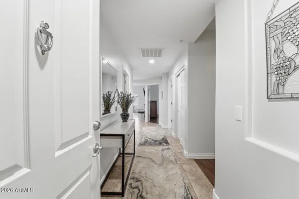 a very nice looking room with a large mirror