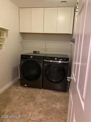 a kitchen with a stove and a sink