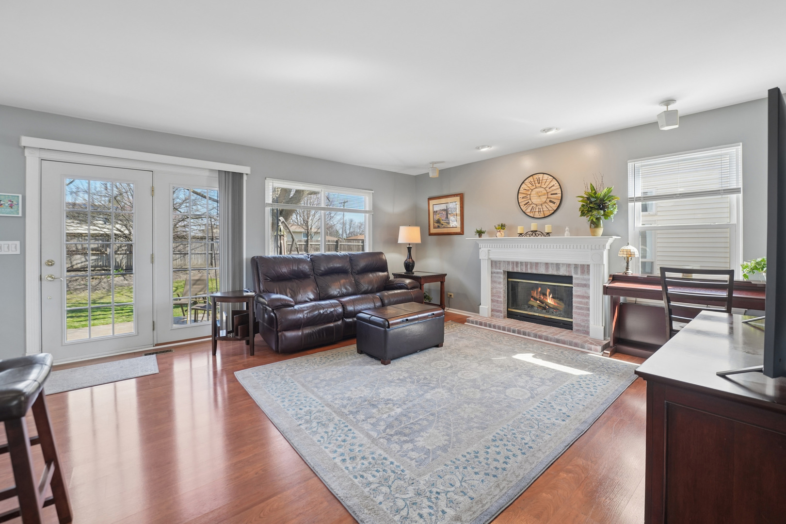 829 Renaissance Drive Carol Stream, IL 60188 - Photo 14 of 35 a living room with furniture and a fireplace