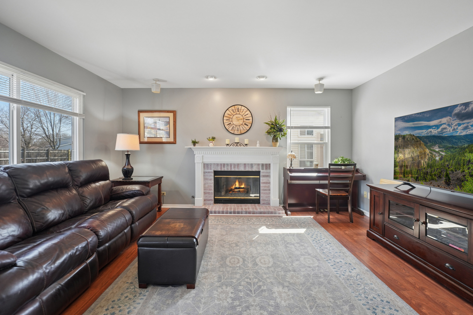 829 Renaissance Drive Carol Stream, IL 60188 - Photo 15 of 35 a living room with furniture and a fireplace