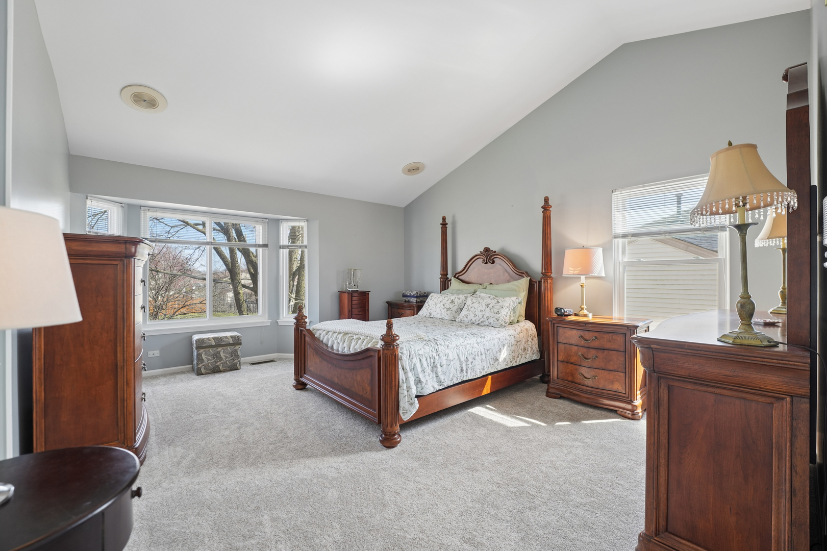 829 Renaissance Drive Carol Stream, IL 60188 - Photo 18 of 35 a bedroom with a bed and large mirror