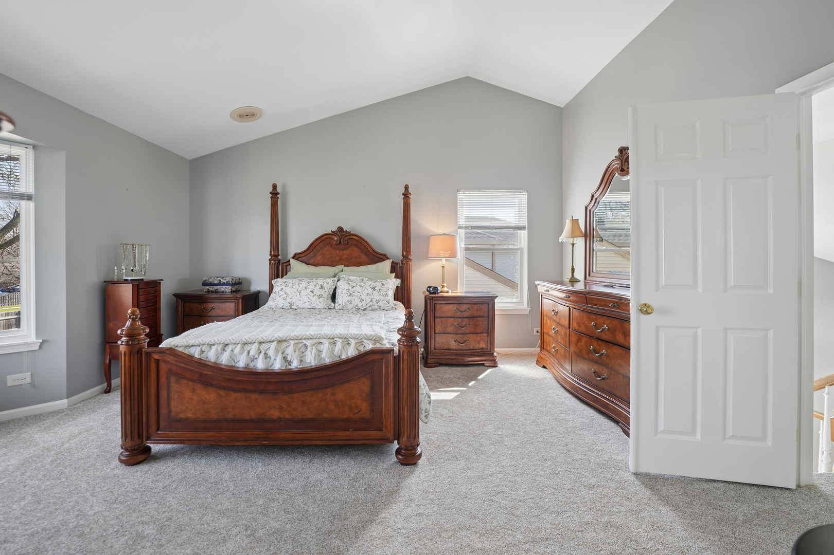 829 Renaissance Drive Carol Stream, IL 60188 - Photo 19 of 35 a spacious bedroom with a bed a dresser and window