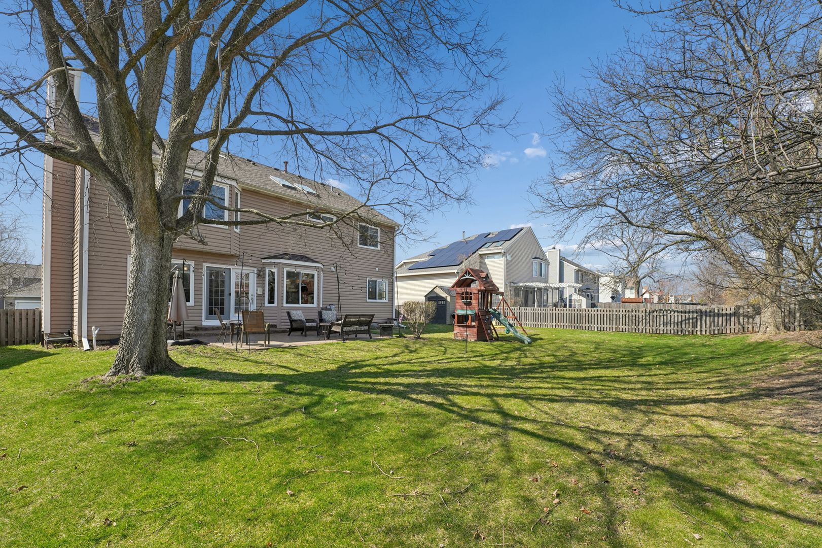829 Renaissance Drive Carol Stream, IL 60188 - Photo 33 of 35 a front view of a house with swimming pool having outdoor seating
