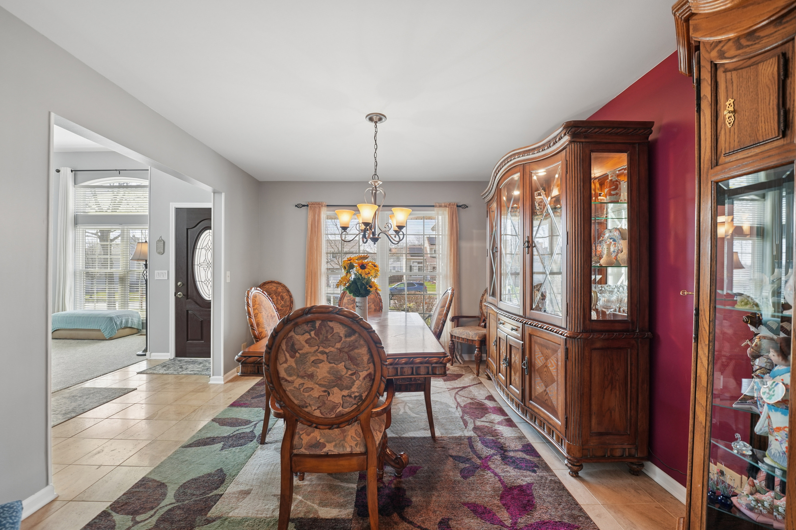 829 Renaissance Drive Carol Stream, IL 60188 - Photo 9 of 35 a view of a dining room with furniture window and wooden floor