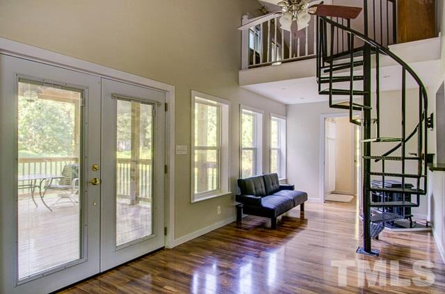 2109 Winkler Road Durham, NC 27712 - Photo 12 of 21 a living room with furniture and wooden floor