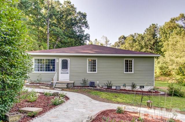 2109 Winkler Road Durham, NC 27712 - Photo 3 of 21 a front view of a house with a yard