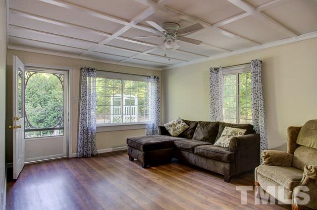 2109 Winkler Road Durham, NC 27712 - Photo 5 of 21 a living room with furniture and a large window
