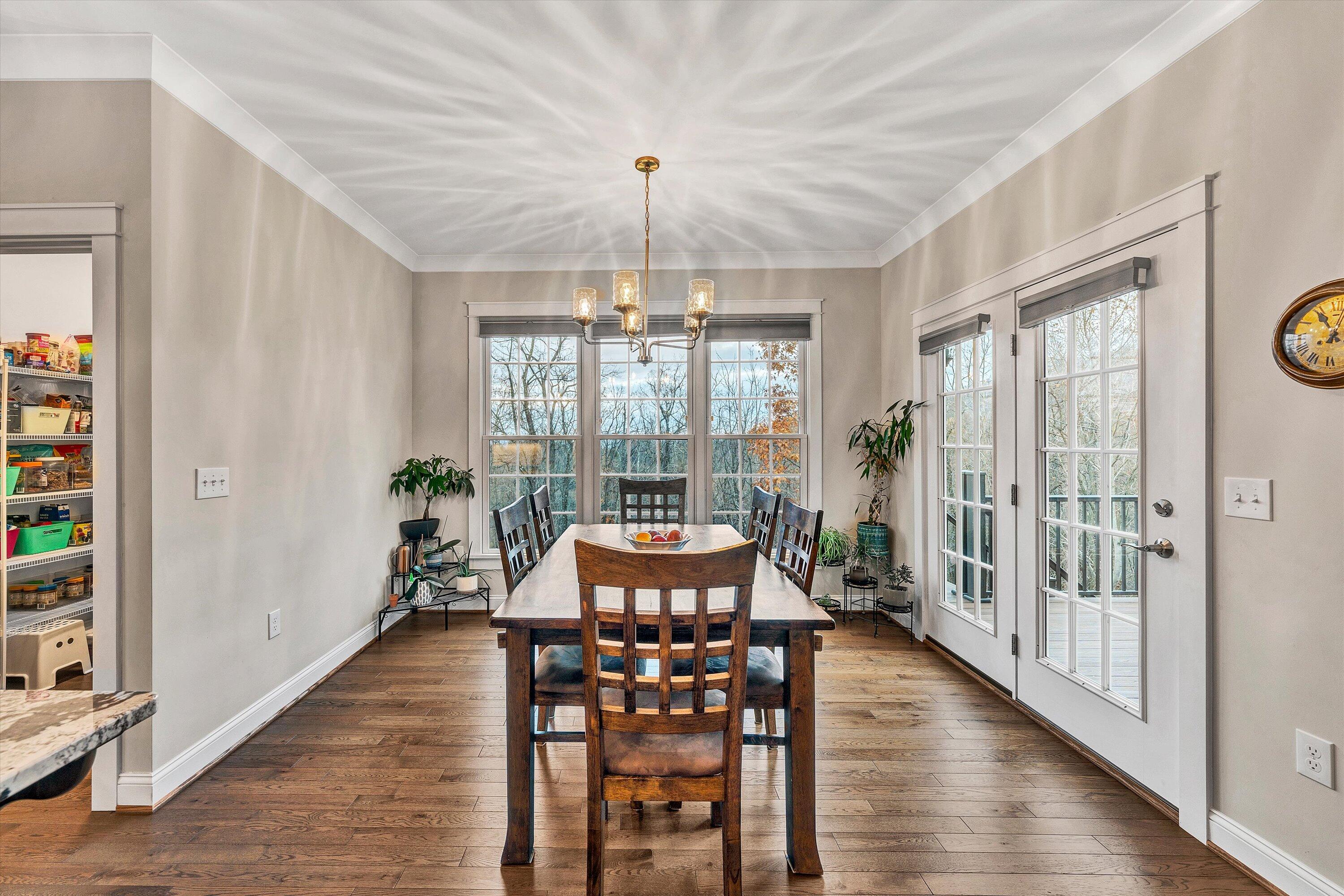 6901 Fairway Ridge Road Salem, VA 24153 - Photo 14 of 58 a view of a dining room with furniture window and wooden floor