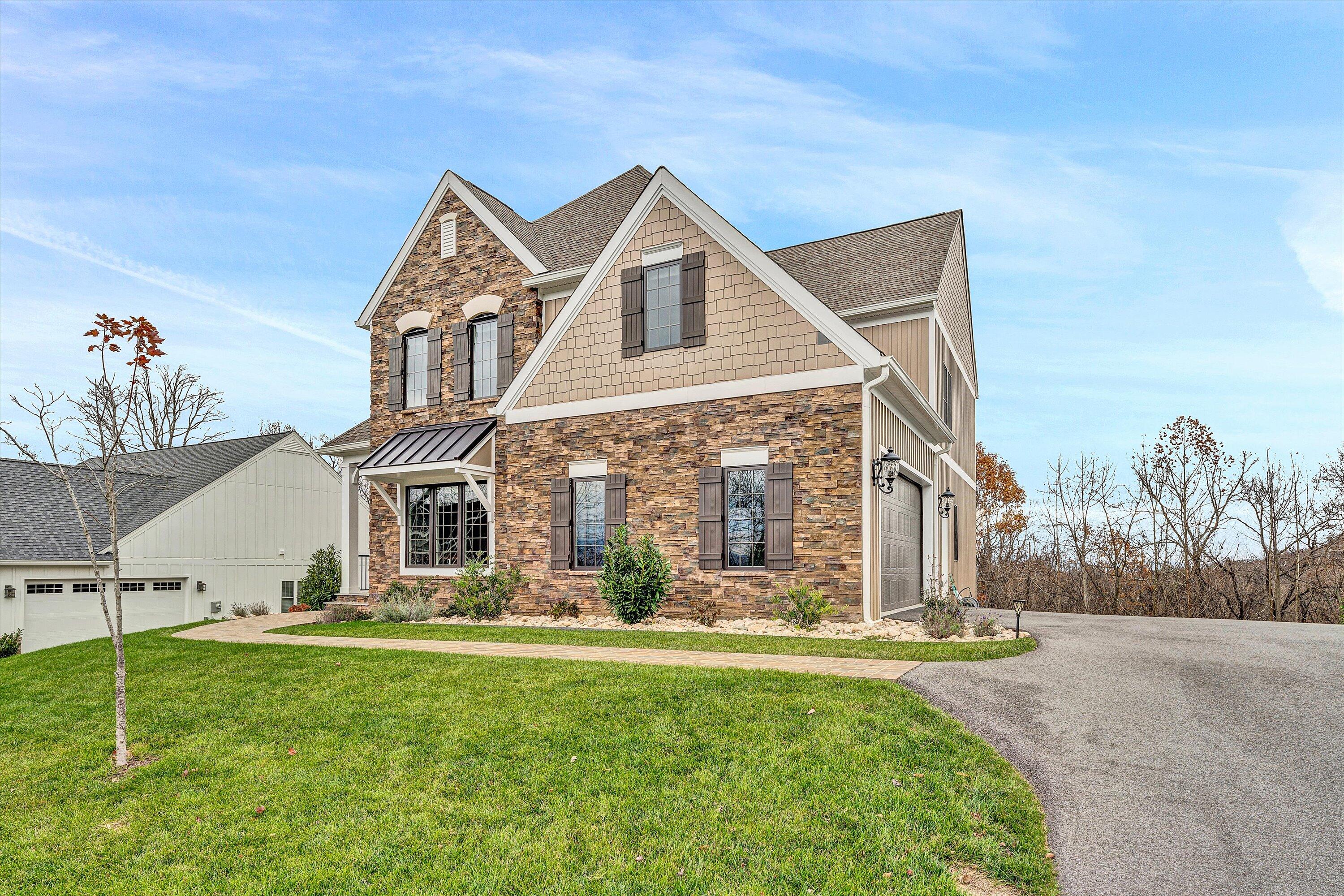 6901 Fairway Ridge Road Salem, VA 24153 - Photo 2 of 58 a front view of a house with a yard