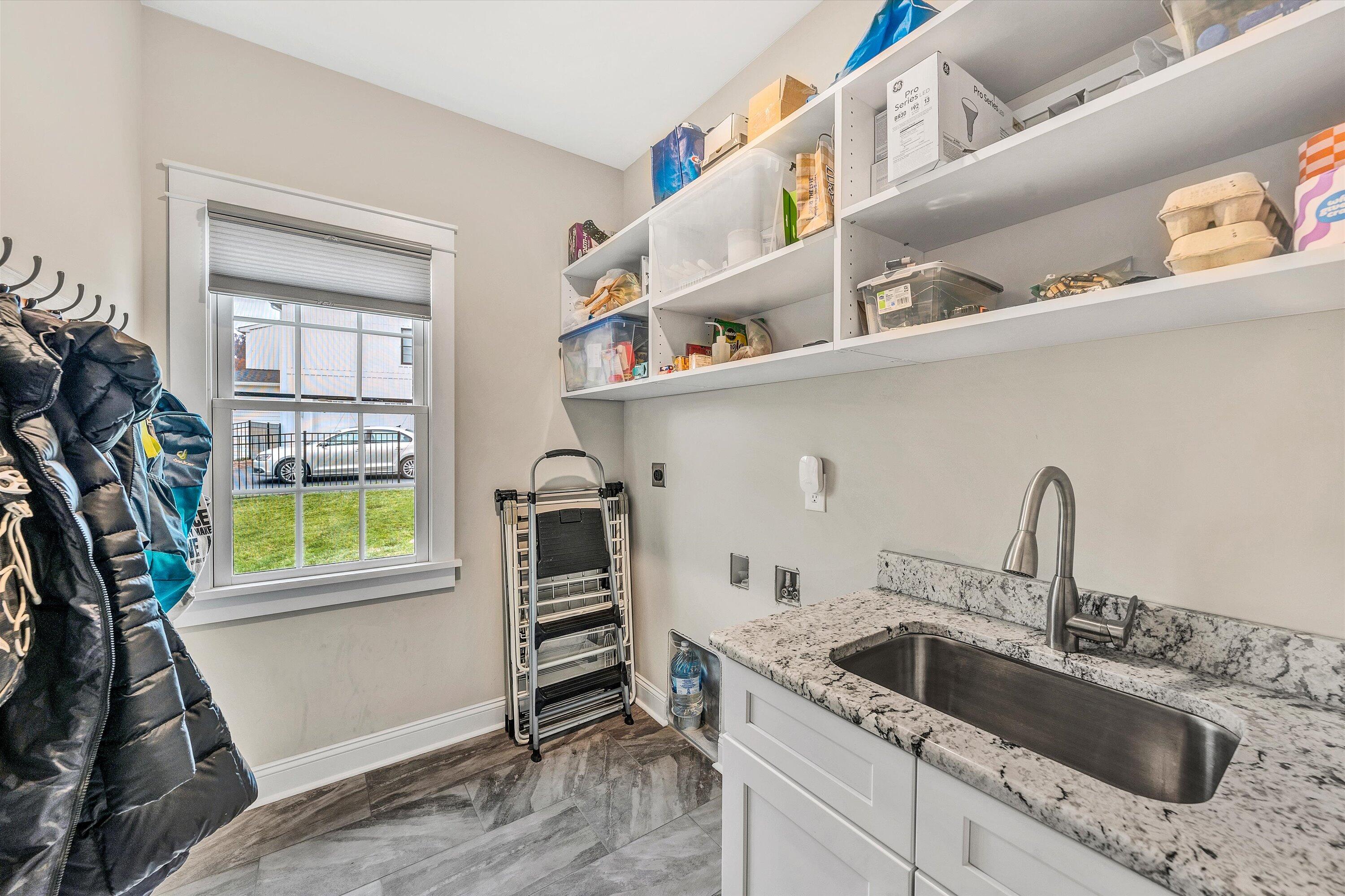 6901 Fairway Ridge Road Salem, VA 24153 - Photo 23 of 58 a kitchen with stainless steel appliances a sink a refrigerator and a window